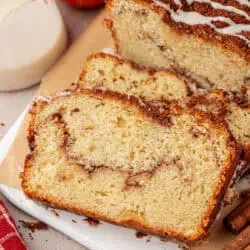 loaf of apple cinnamon bread with a few slices cut