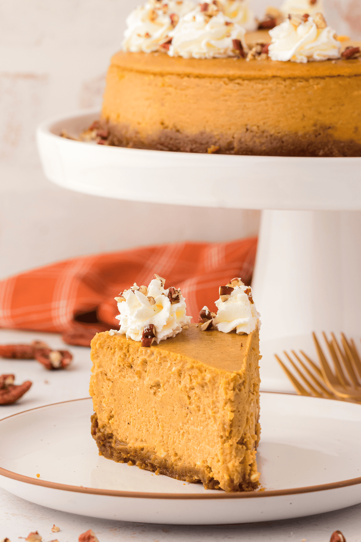 slice of pumpkin cheesecake on a plate