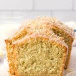 slice of coconut bread topped with toasted coconut