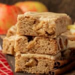 three caramel apple blondies stacked on top of each other