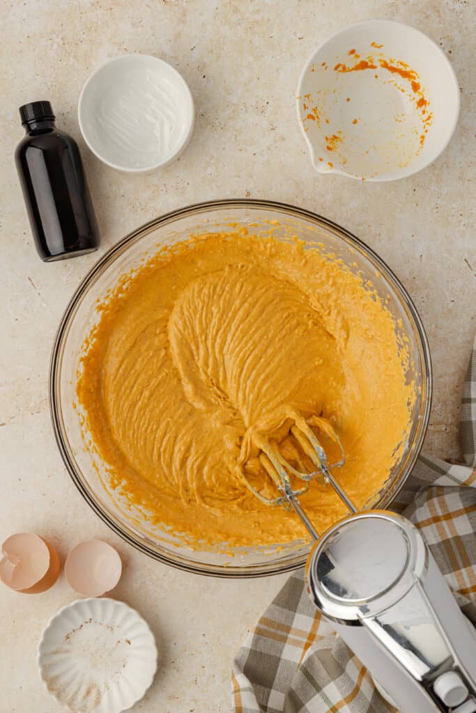 pumpkin cheesecake batter in a bowl