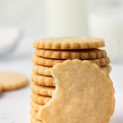 a stack of cut out shortbread cookies