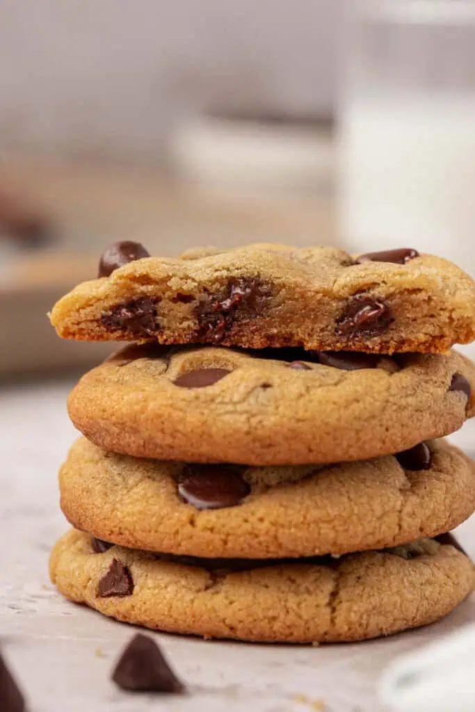 four small batch chocolate chip cookies stacked