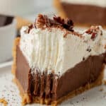 slice of chocolate pudding pie with a bite missing