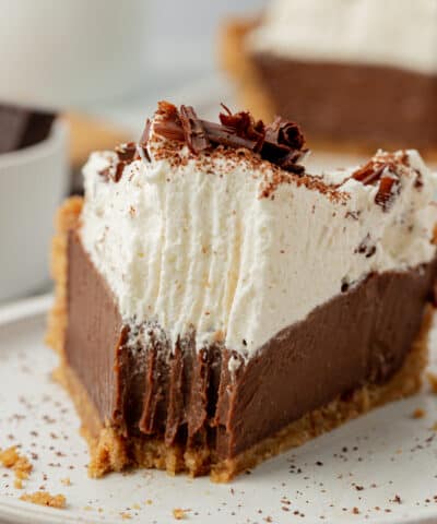 slice of chocolate pudding pie with a bite missing