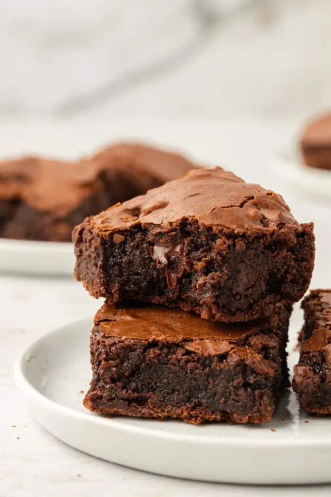 two small batch brownies stacked on top of each other