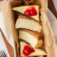 small batch cheesecake slices in a loaf pan