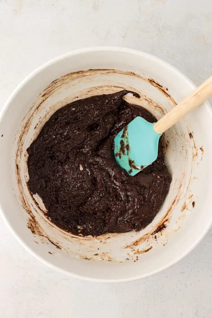 brownie batter in a bowl with a spatula