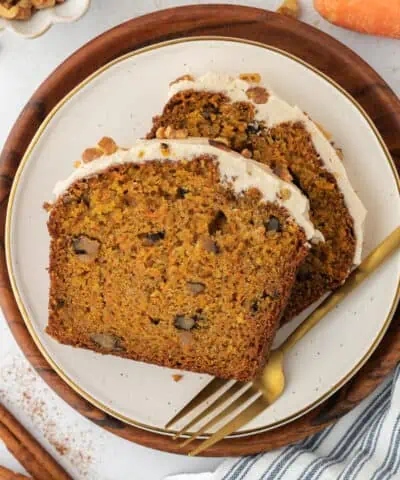 two carrot cake loaf slices on a plate