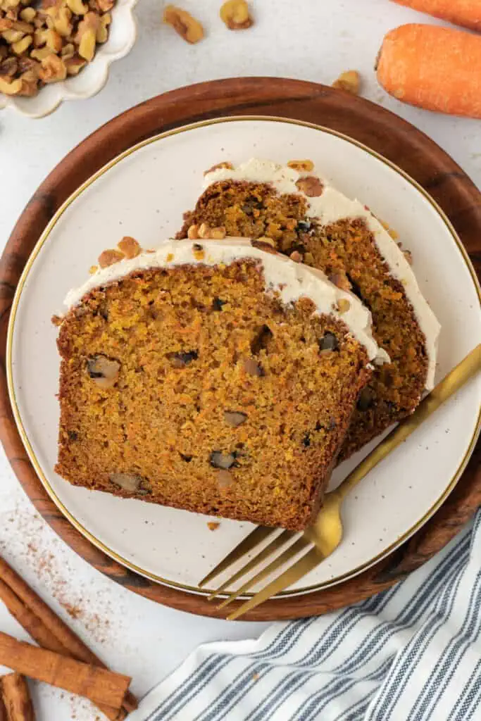 two carrot cake loaf slices on a plate