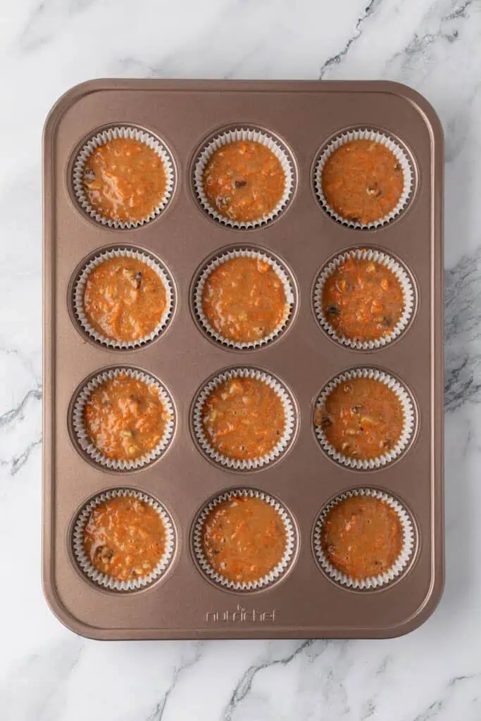 cupcake batter in the cupcake wells