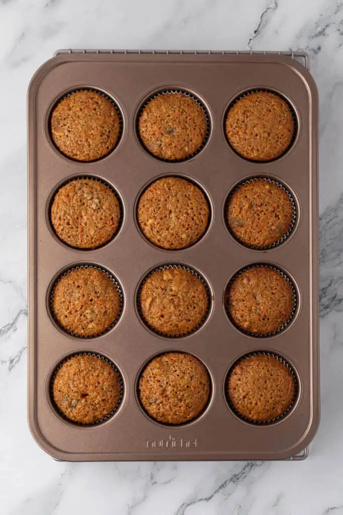 baked carrot cake cupcakes in pan