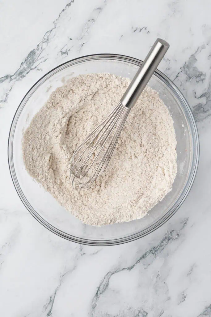 dry ingredients in a bowl with a whisk