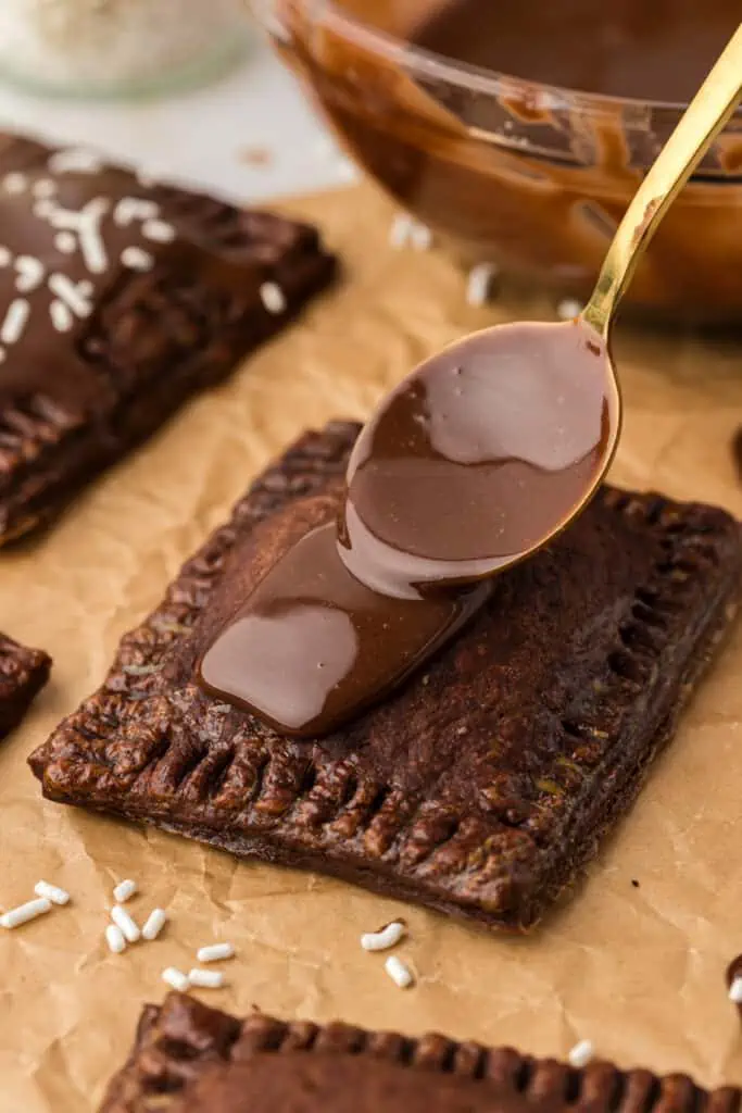 chocolate glaze spread on top of chocolate pop tart
