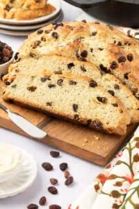 irish soda bread sliced on a cutting board