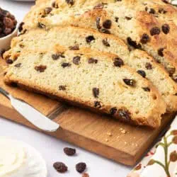 irish soda bread sliced on a cutting board