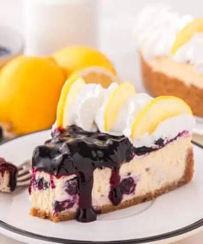 slice of lemon blueberry cheesecake on a plate