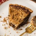 slice of shoofly pie and a fork on a plate