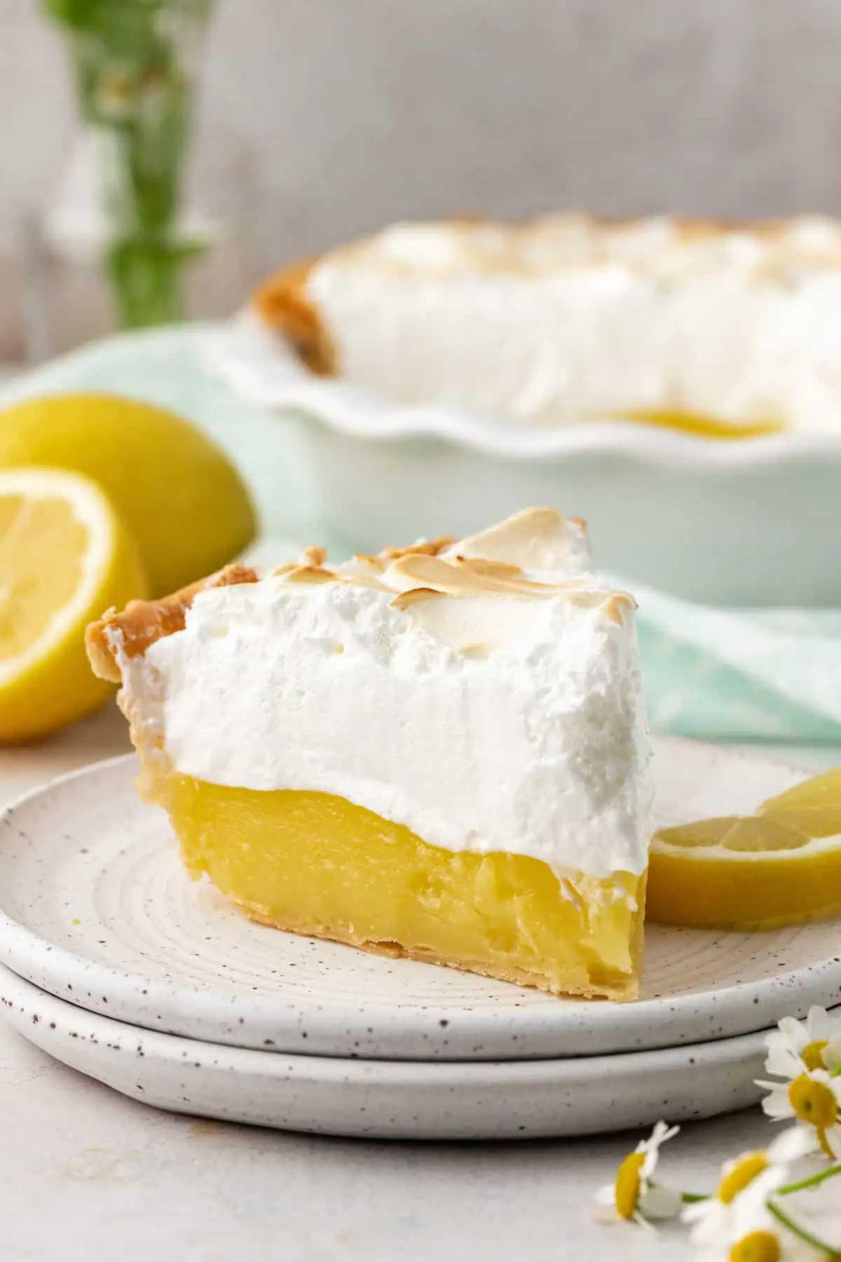 lemon meringue pie slice on a plate