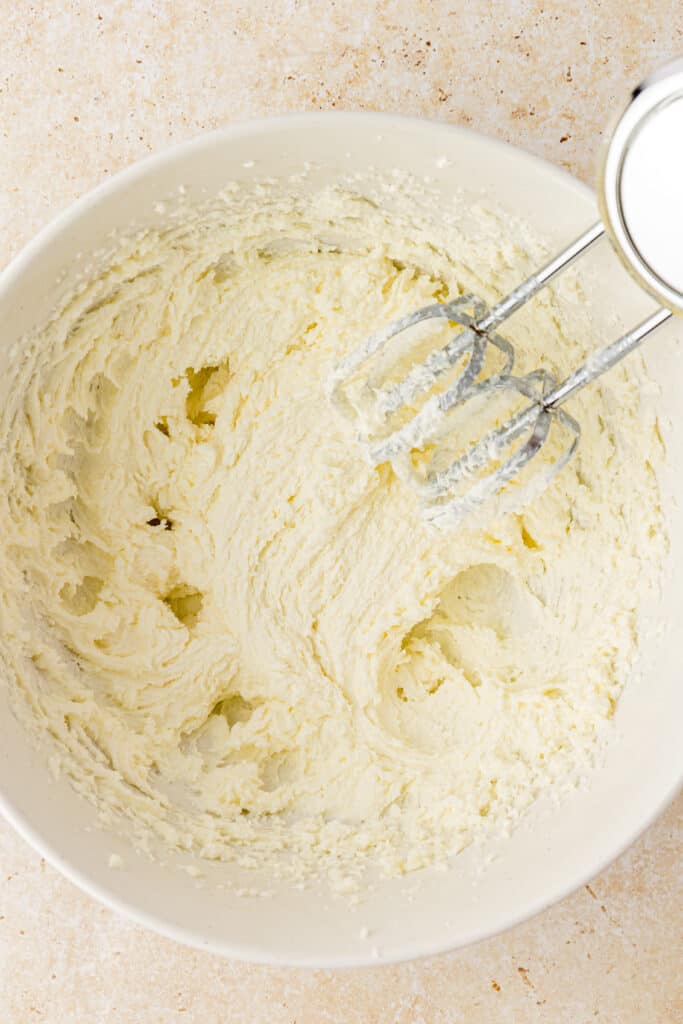 butter and sugar creamed together in a bowl