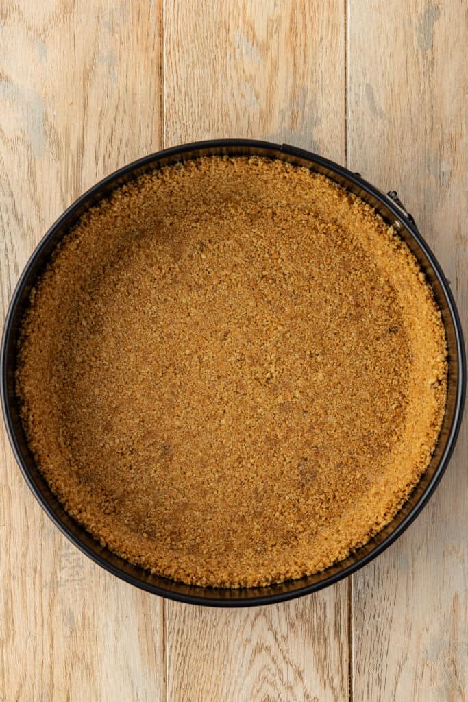 graham cracker crust in a springform pan