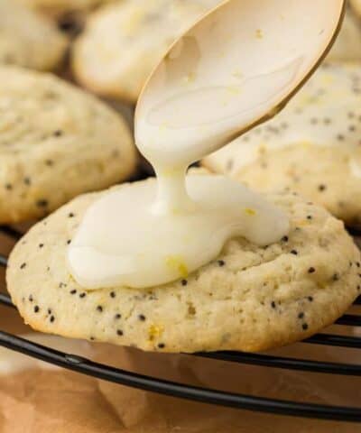 lemon icing glaze drizzled over a lemon cookie