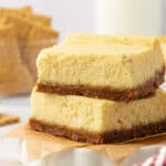 two cheesecake bars stacked