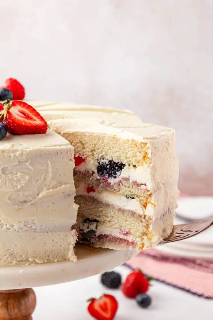 slice being removed from the whole cake