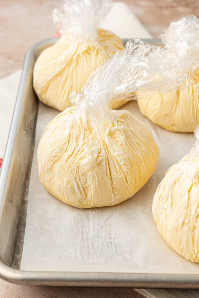 ice cream balls shaped into balls and wrapped in plastic wrap