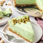 slice of no bake pistachio cheesecake on a plate