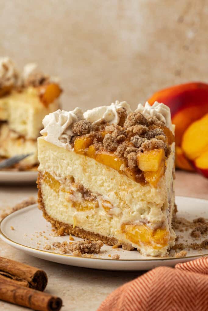 slice of peach cobbler cheesecake