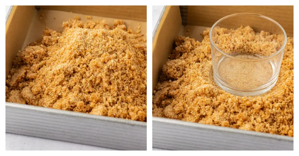 graham cracker crust mixture pressed into a pan with a glass