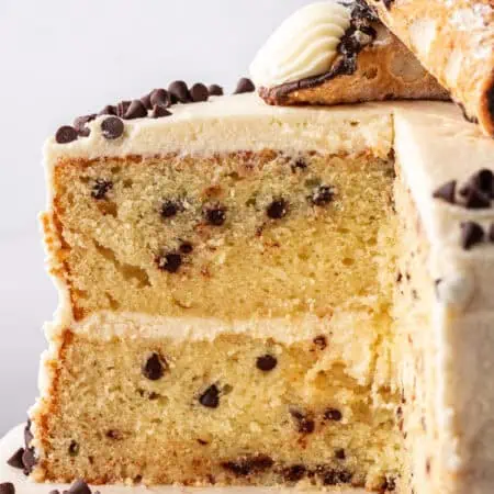cannoli cake with slice missing