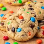 m&M chocolate chip cookies on parchment paper