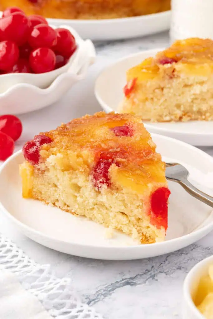 slice of pineapple upside down cake on a plate