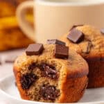 chocolate chunk muffin with a bite taken out of it