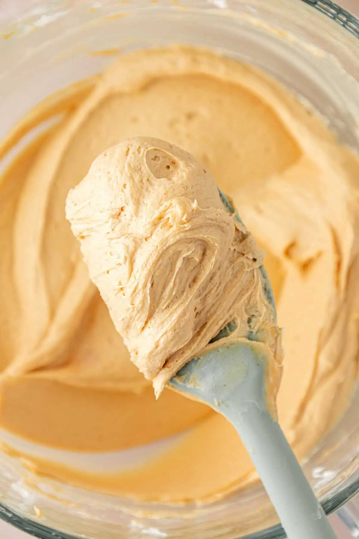 peanut butter cream cheese frosting on a spatula