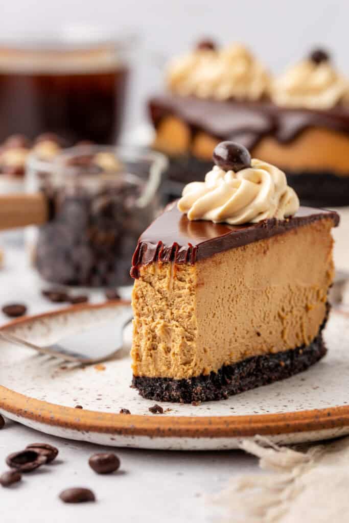 slice of espresso cheesecake with a bite missing
