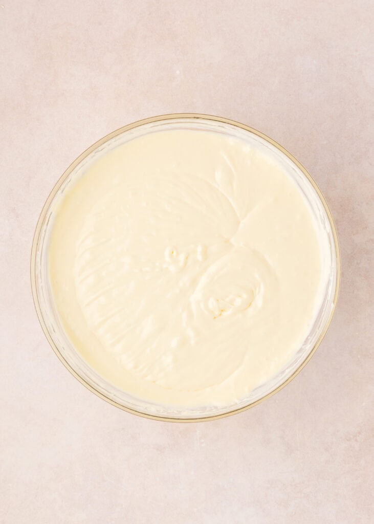 cheesecake batter in a bowl after eggs have been added