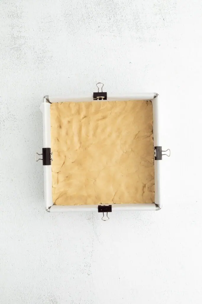 cookie dough pressed into pan