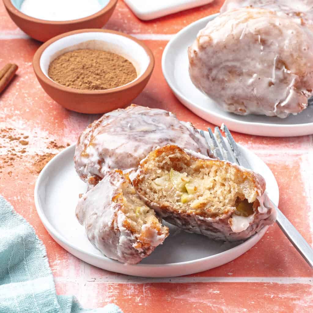 applesauce fritter on a plate cut in half