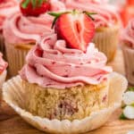 strawberry cupcake with cupcake liner peeled away