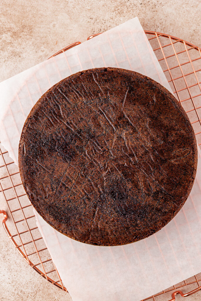 baked chocolate orange cake on a wire rack 