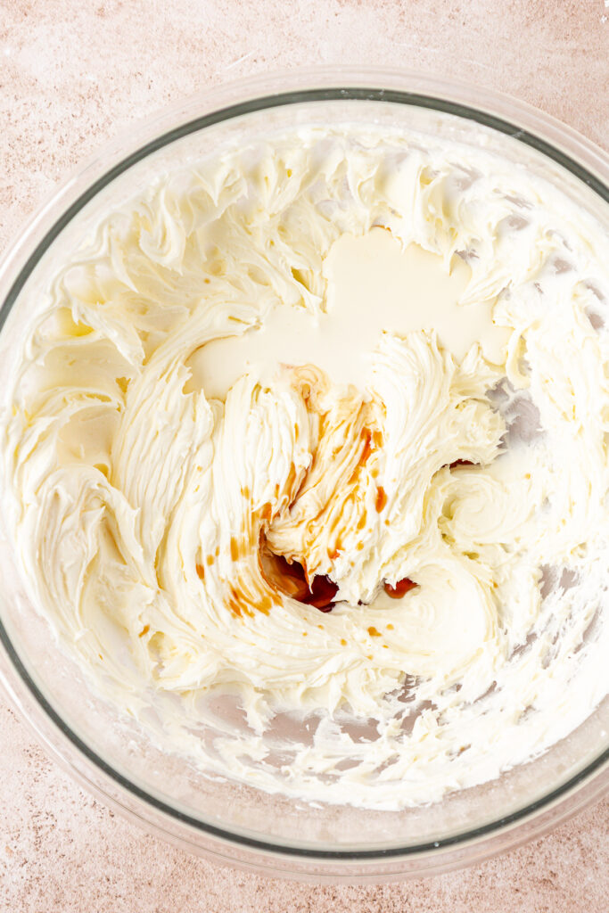 vanilla and heavy cream added to frosting mixture