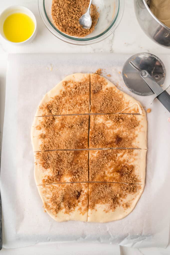 cinnamon roll dough cut lengthwise in half then into 8 equal sections cross wise