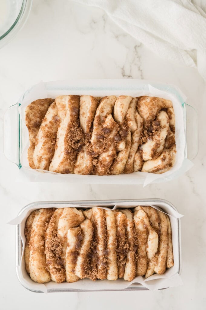 proofed bread loaves ready to bake