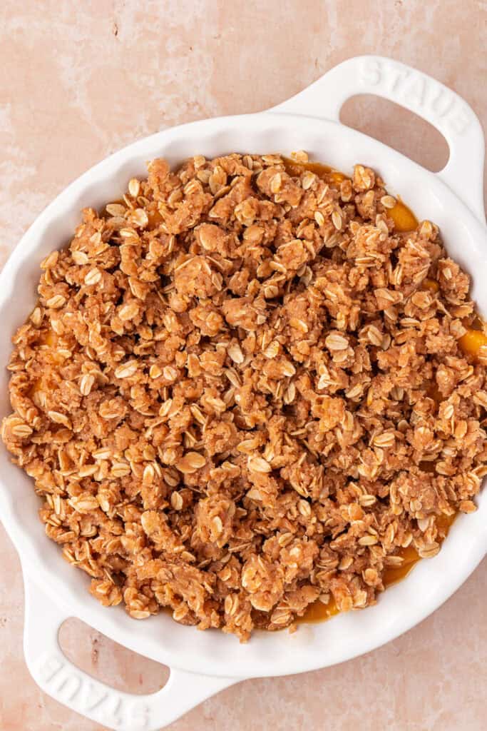 crisp topping sprinkled over peach filling