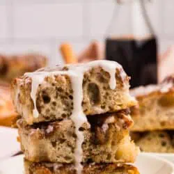 three slices of cinnamon focaccia stacked on each other