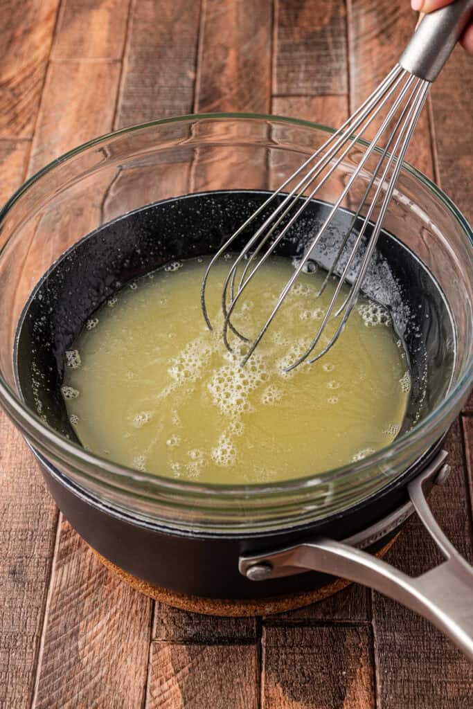 egg whites and sugar heated over a double boiler