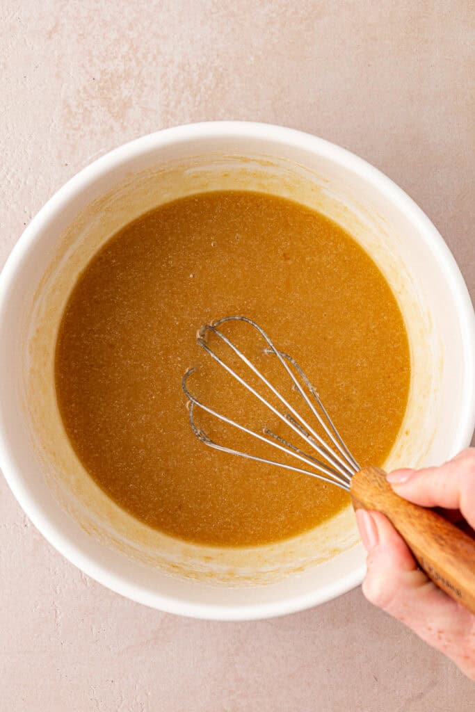 wet ingredients whisked together in a bowl